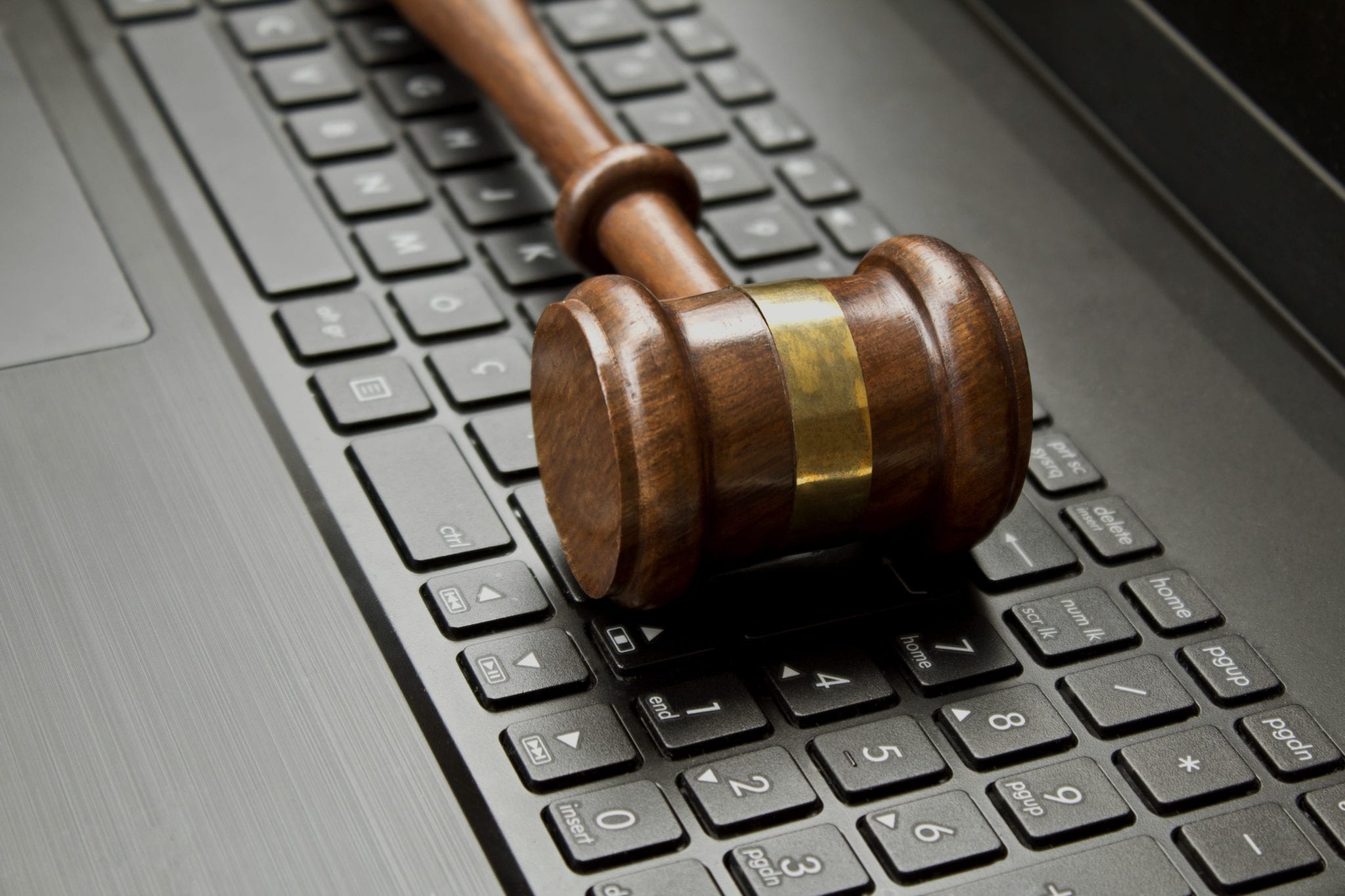 judge gavel on a computer keyboard