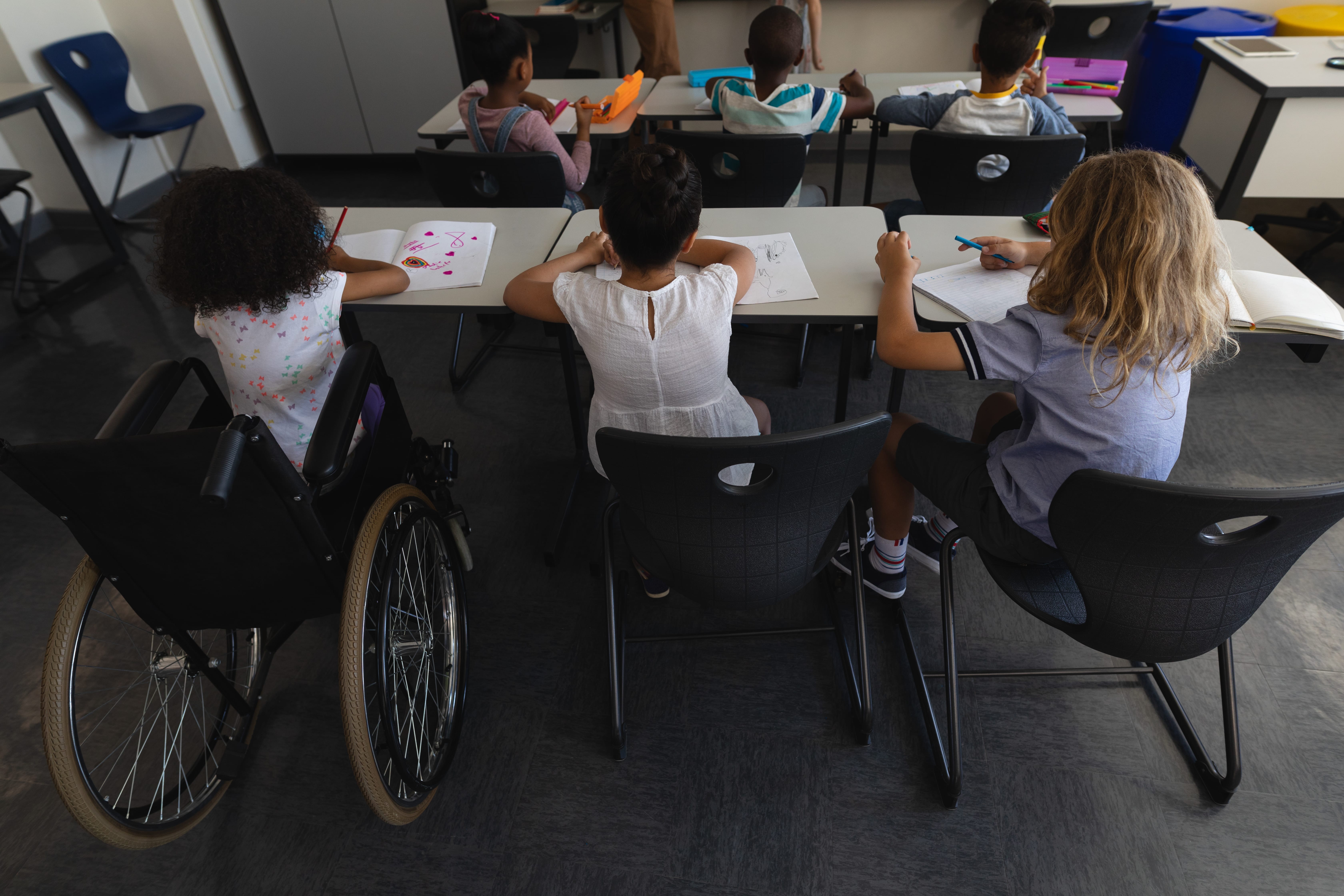 Student in wheelchair in classroom