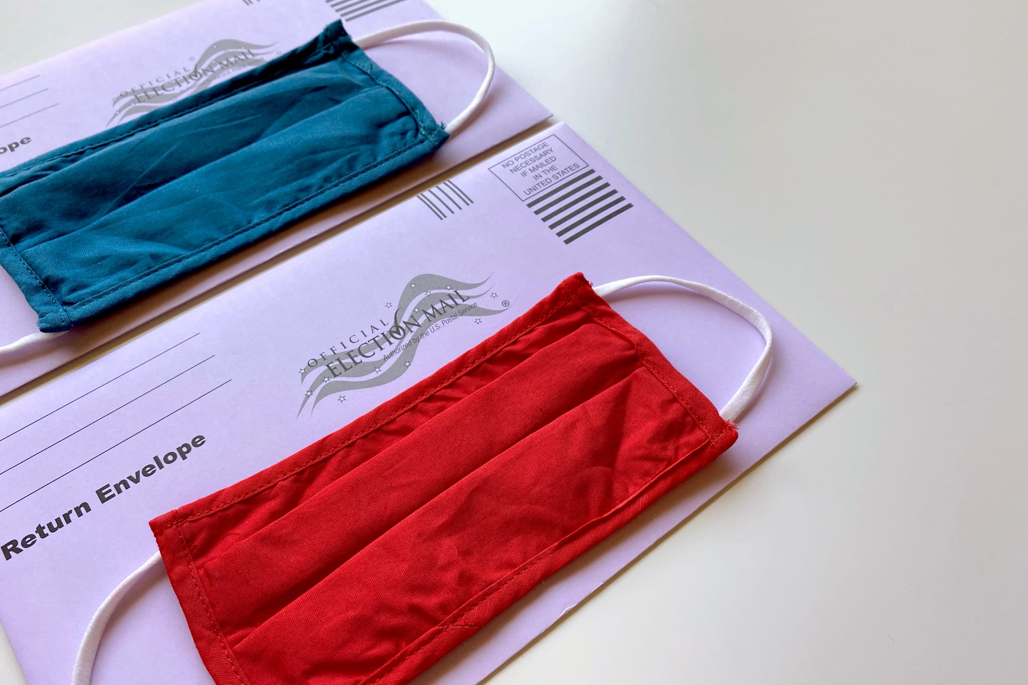 American election mail envelopes with face masks